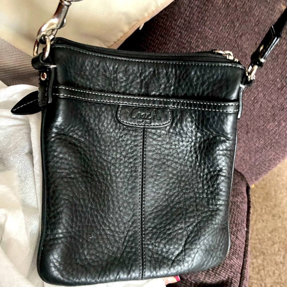 Black coach bag, over the shoulder slightly used almost new.